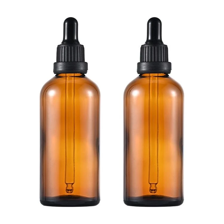empty glass dropper essential oil bottle